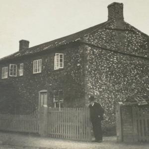 0044B Thomas Rutterford outside his house on Mill Road 1920s