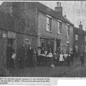 001PH Brewers Tap PH with Electioneering Poster in window 1907
