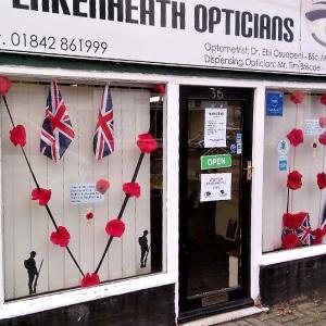 028WWI Opticians poppies window 6 11 18