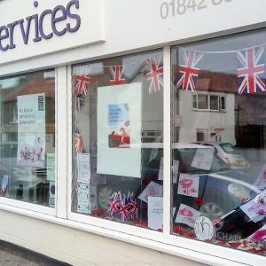 032WWI poppies window funeral services 6 11 18 2